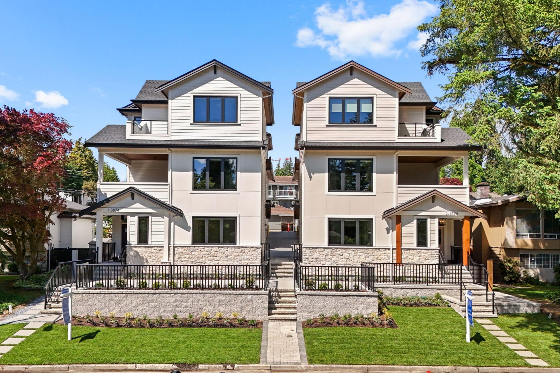 Side-by-side homes finished by BMO Siding